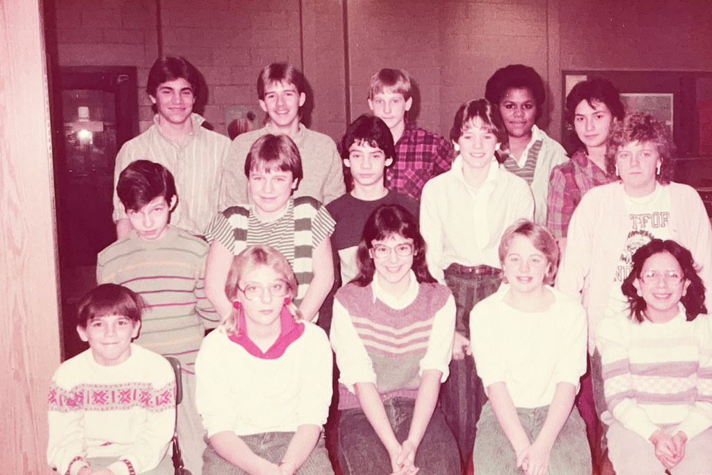 A collection of vintage Hartford Public Schools photographs featured in Hartford Rewind | Volume 2. The images include students posing with academic trophies, science classroom activities, elementary students reading and participating in class, hands-on classroom projects, cultural learning activities, CPR training, group class photos, Adult Education displays at a community event, students gathered outdoors, and various classroom and school life scenes from past decades. The photographs capture everyday moments, learning experiences, and student life throughout Hartford Public Schools' history.