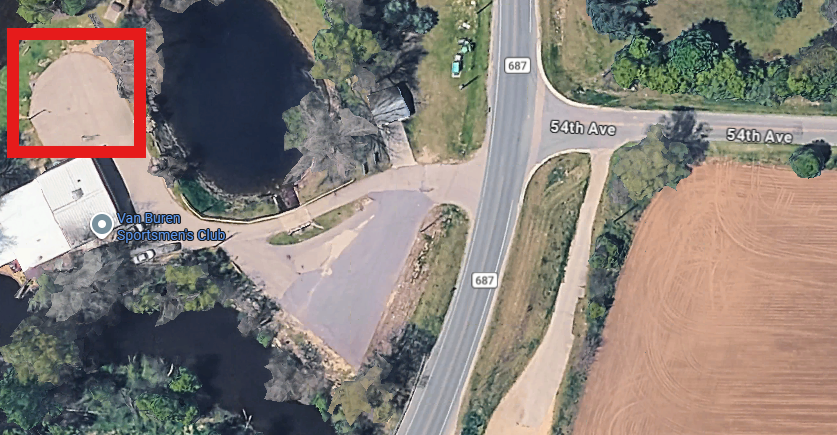 Satellite view of the Van Buren Sportsmen’s Club area near County Road 687 and 54th Avenue. A red box highlights a paved turnaround or parking area northwest of the club building.