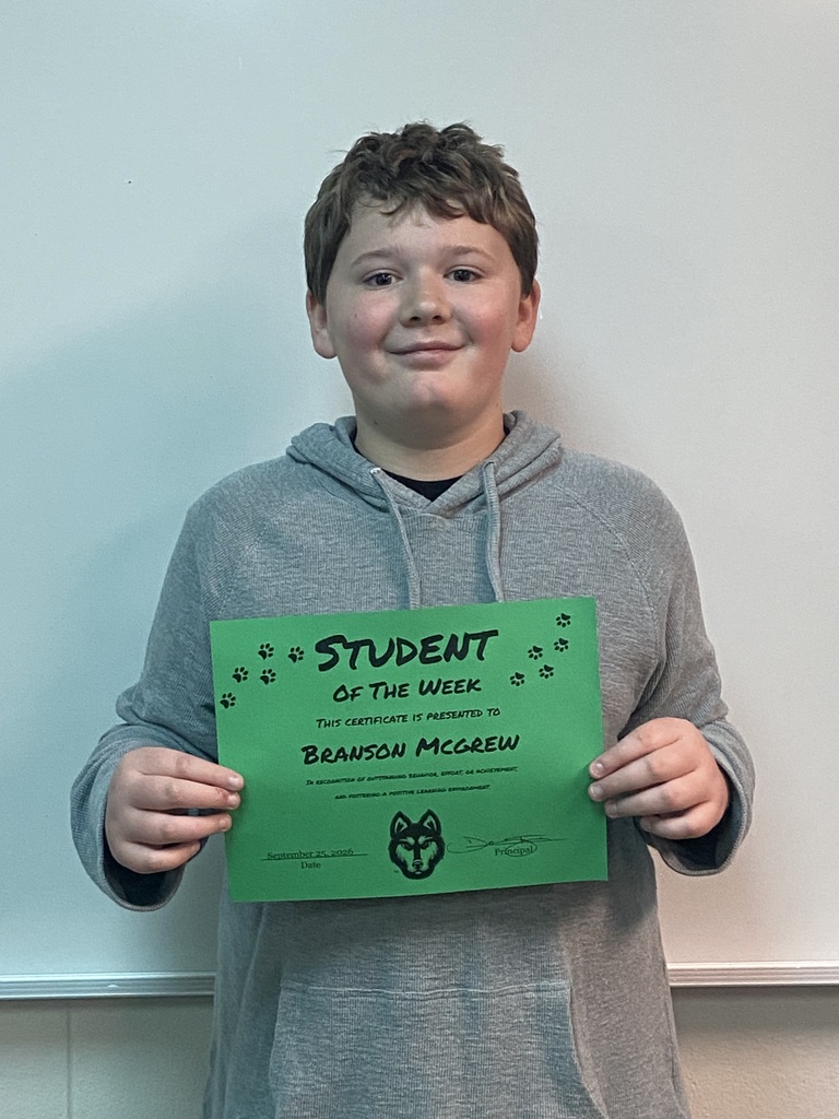 branson mcgrew with his hms student of the week certificate