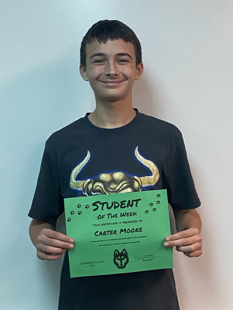 carter moore with his hms student of the week certificate