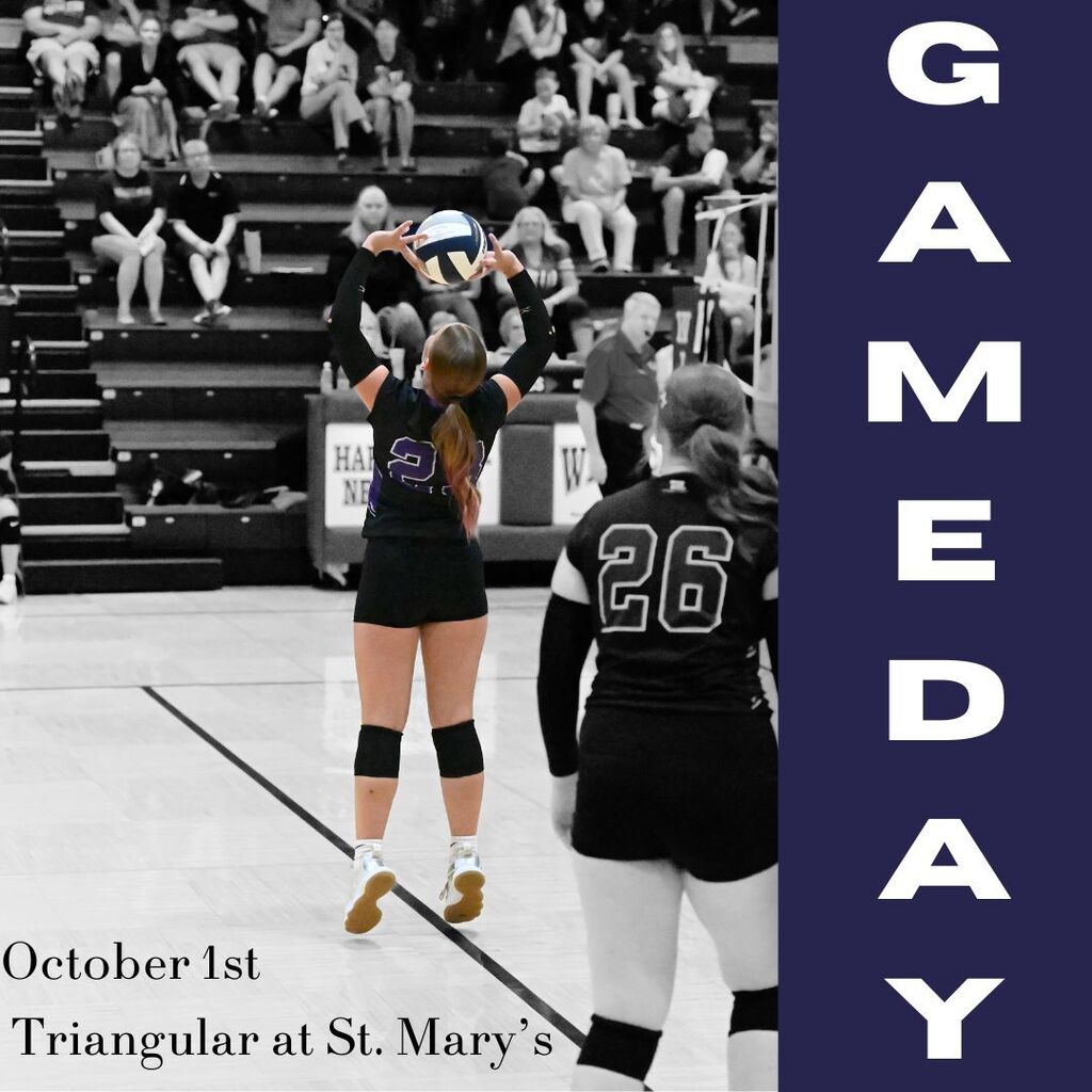 A volleyball player sets the ball as teammate 26 watches on court, with spectators behind; “Game Day,” October 1, triangular at St. Mary’s.