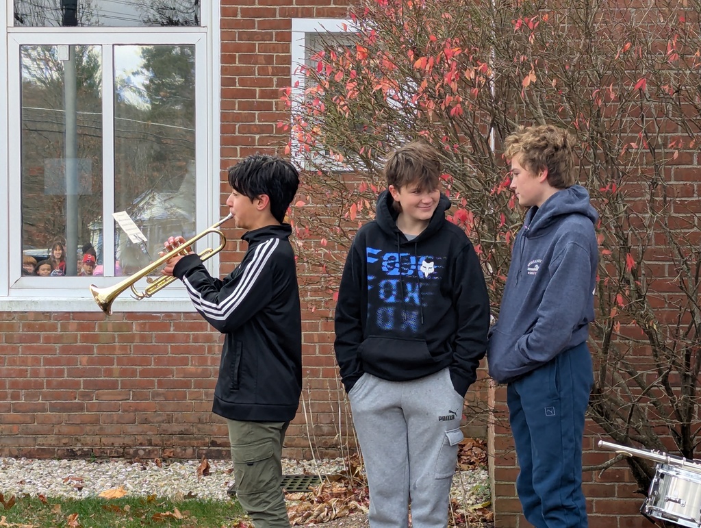 Student playing taps.