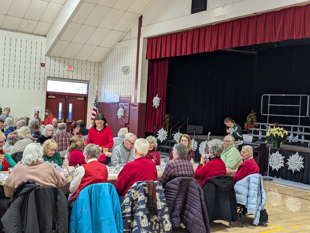 Seniors sitting at tables