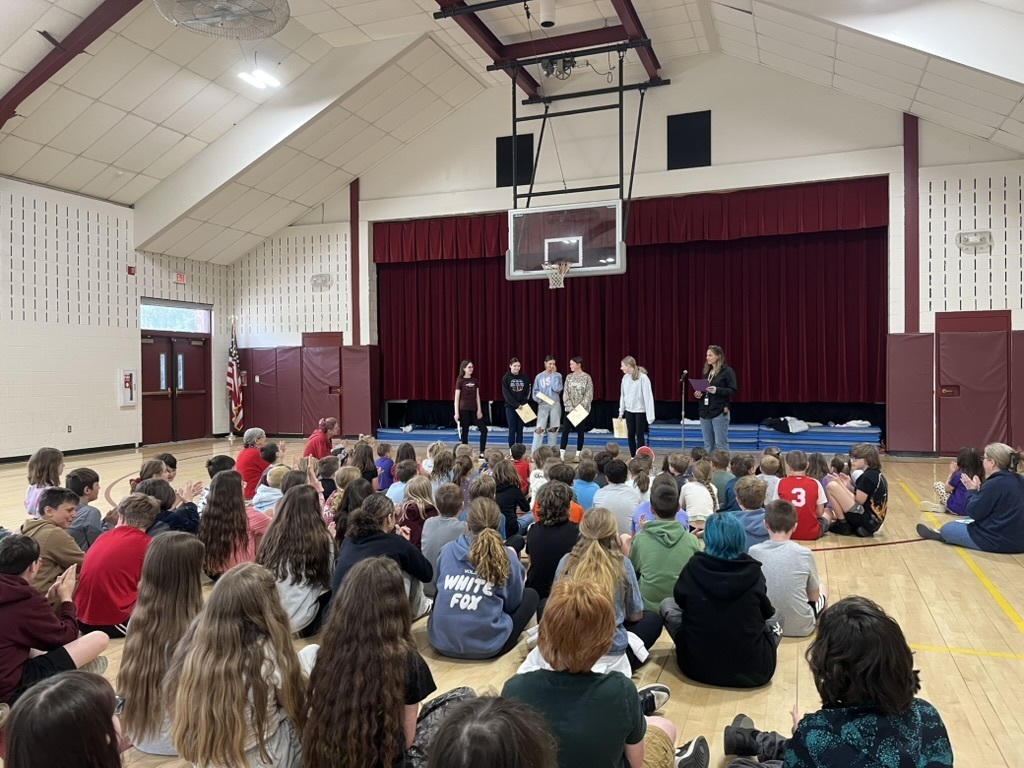 Gym with kids at assembly