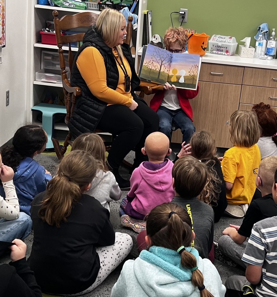 Mrs. Benz reading to 2nd grade students