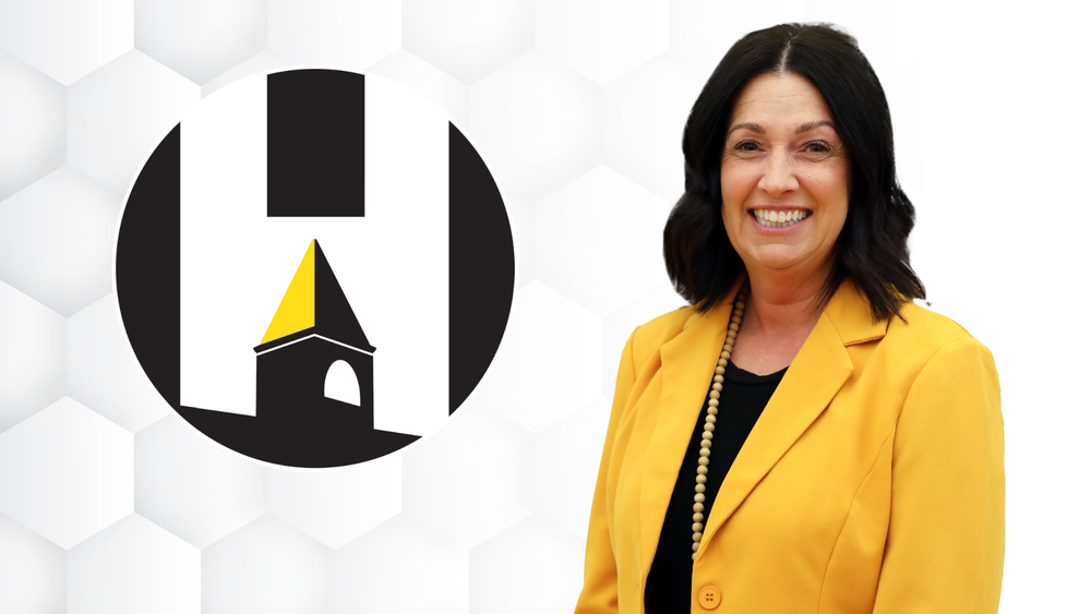 Bezares next to CUSD 50 logo