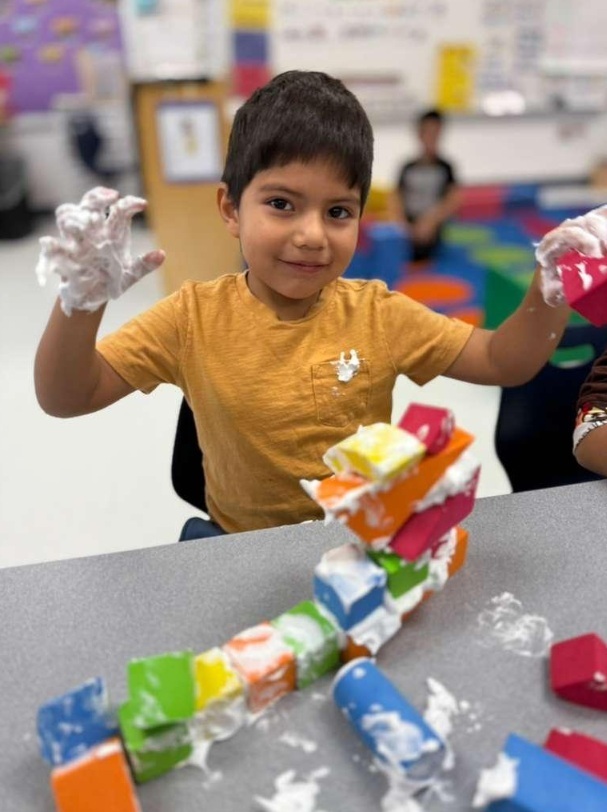 Building with shaving cream and blocks