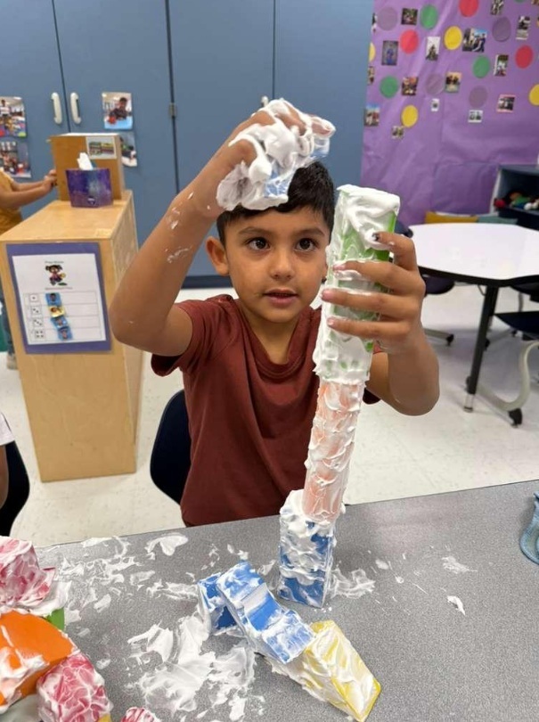Building with shaving cream and blocks