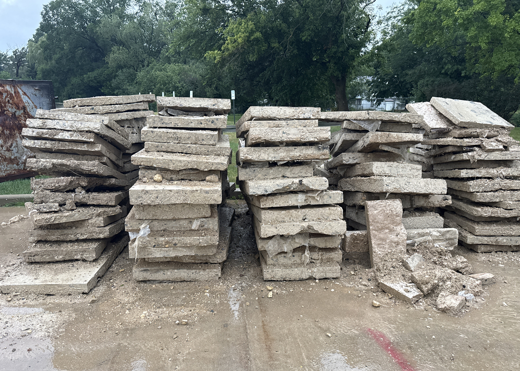 Blocks of cement from gym floor.