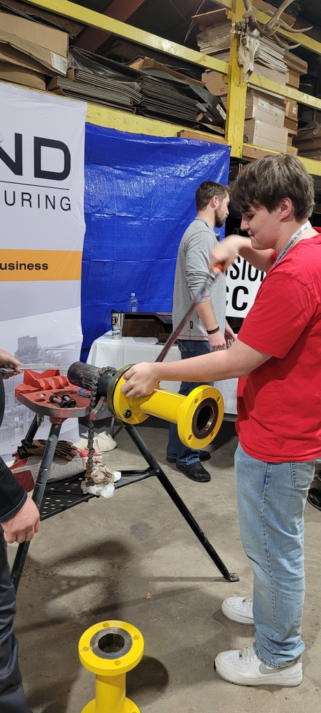 Michael turning wrenches