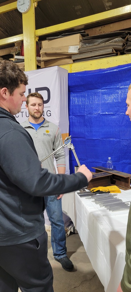 Hayden making a straw