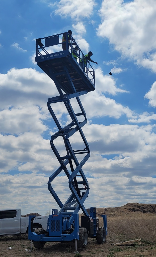 Dropping bean bags from the scissor lift high in the air