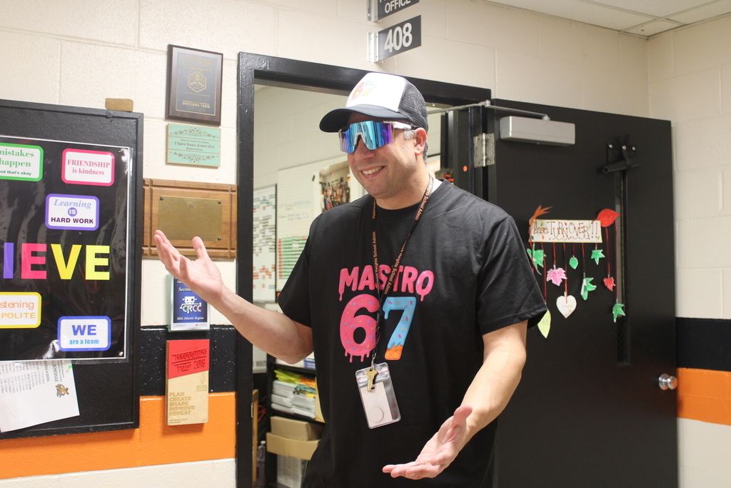 Mr. Mastro doing the "6 7" pose. 