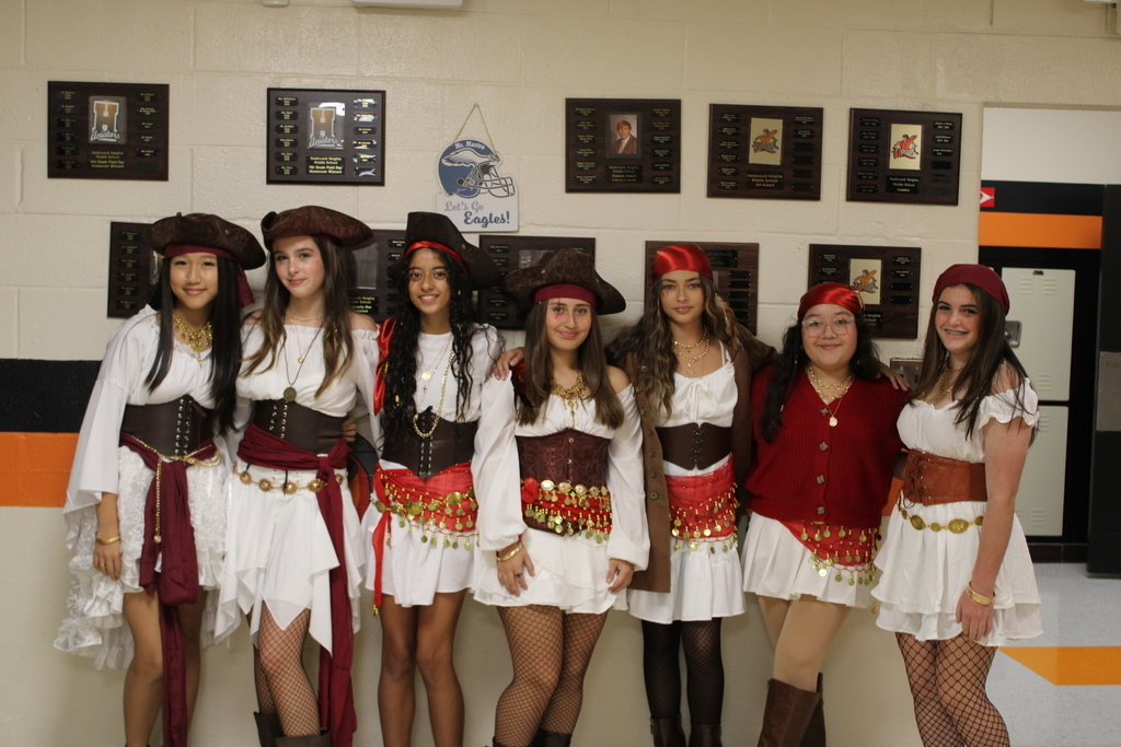 Kids posing in Halloween costumes. 