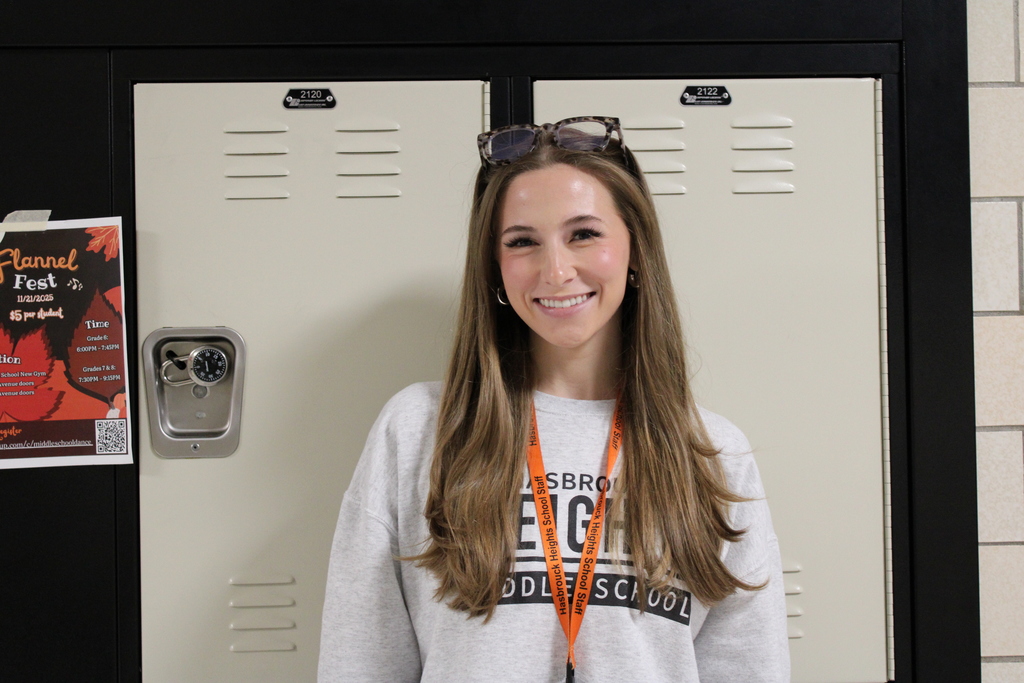 Miss Samarelli wearing orange and black!