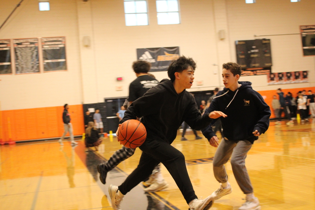 Students playing basketball.
