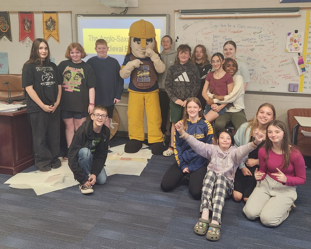 Victor E. Saxon with Hastings Middle School students