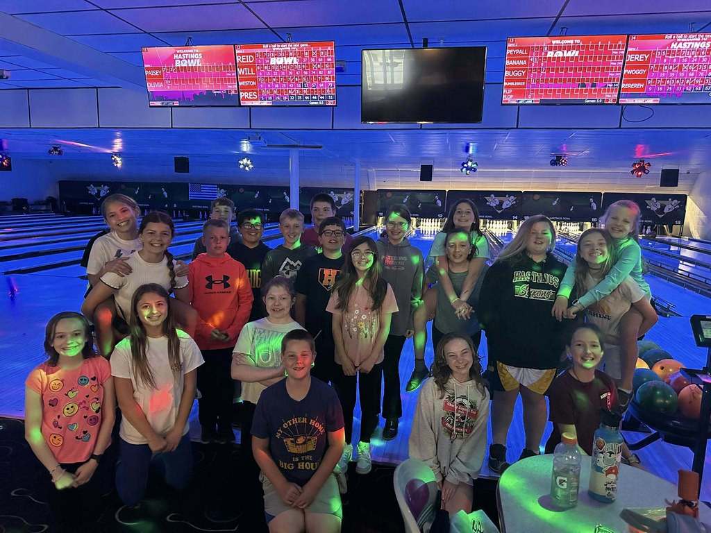Northeastern Elementary's fifth grade safeties enjoying pizza, popcorn and bowling.