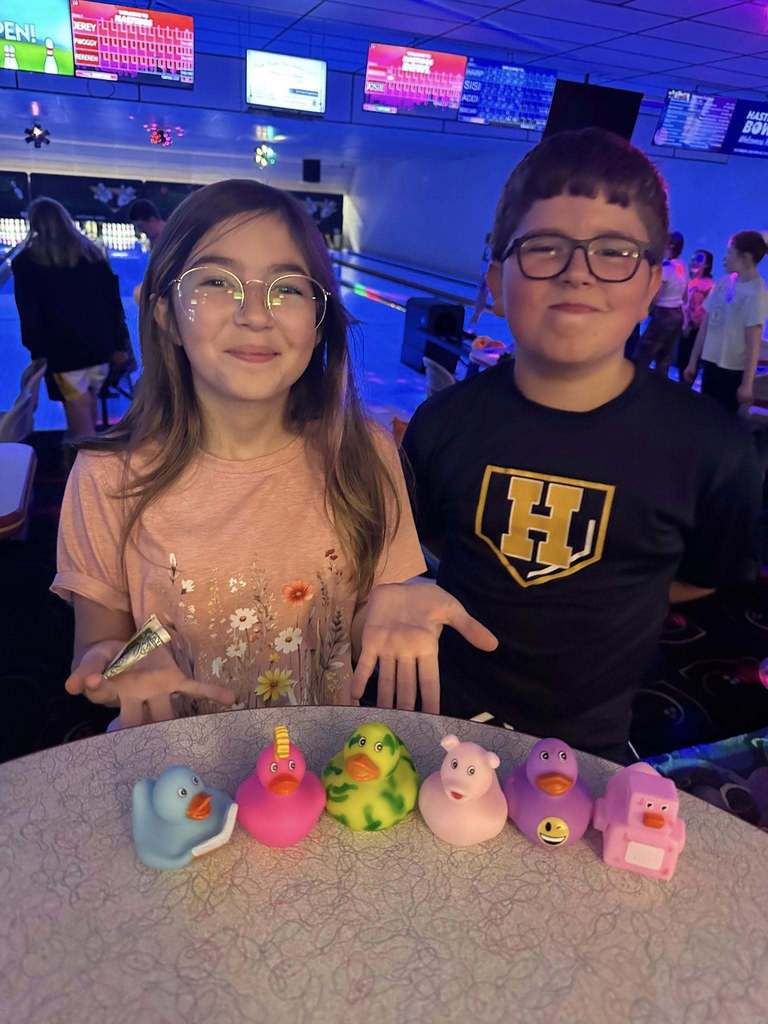 Northeastern Elementary's fifth grade safeties enjoying pizza, popcorn and bowling.