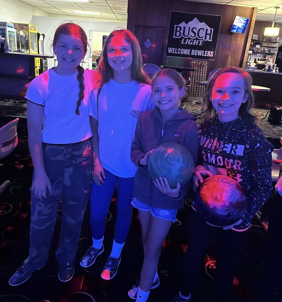 Northeastern Elementary's fifth grade safeties enjoying pizza, popcorn and bowling.