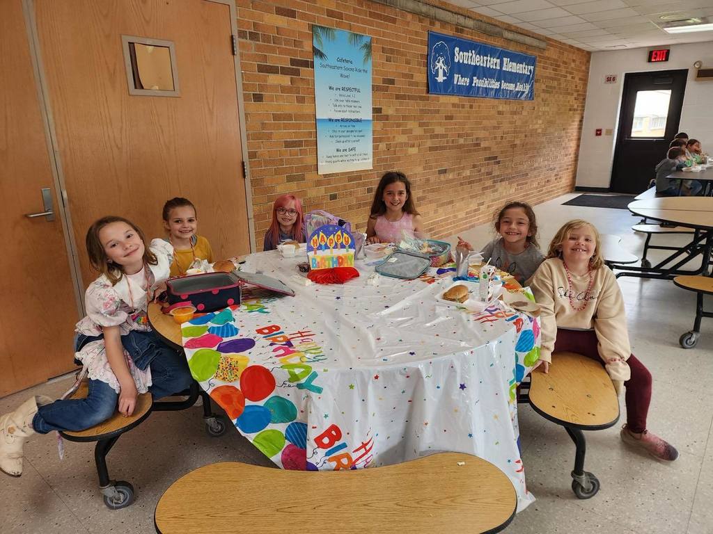 Students gathered for a meal to celebrate their birthday