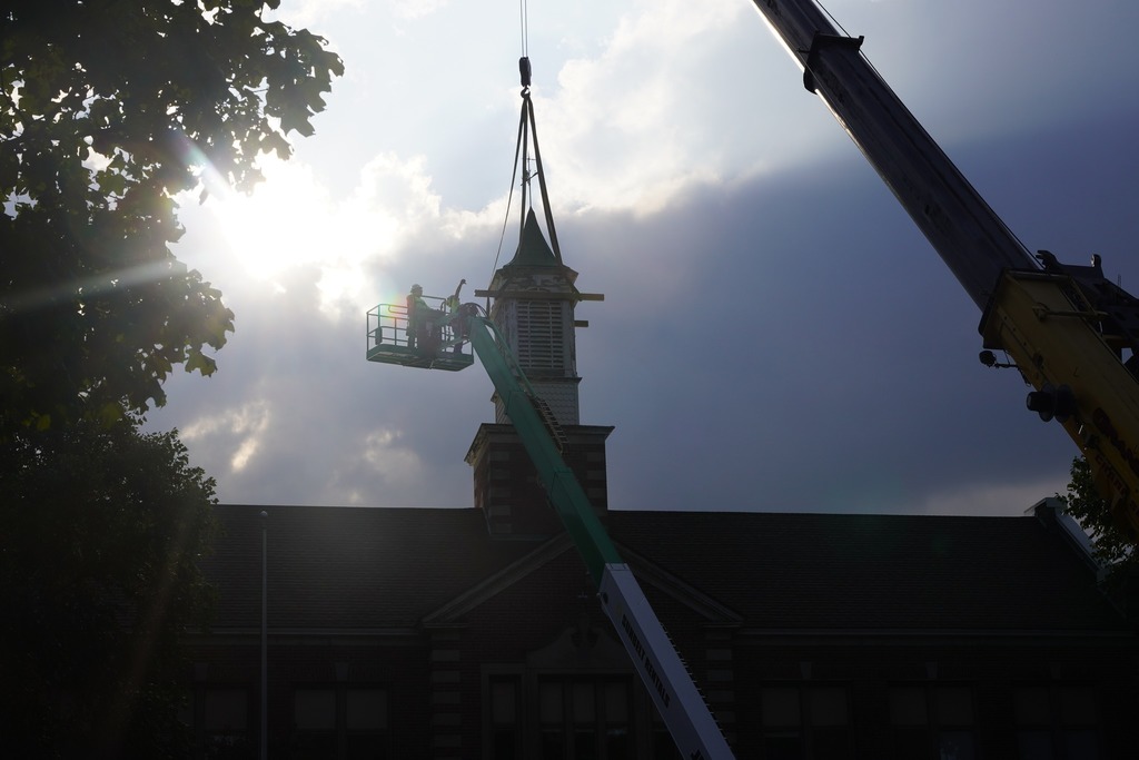 Crews work to remove the bell tower at Central Elementary School.