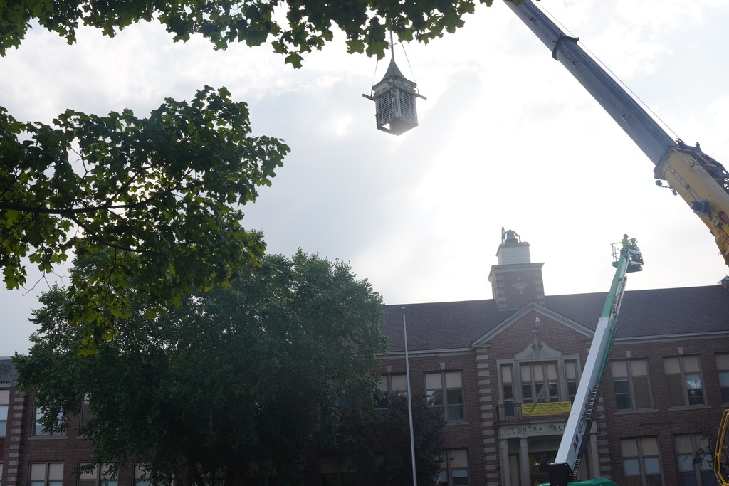 Crews work to remove the bell tower at Central Elementary School.