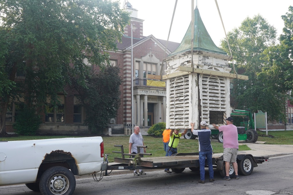 Crews work to remove the bell tower at Central Elementary School.