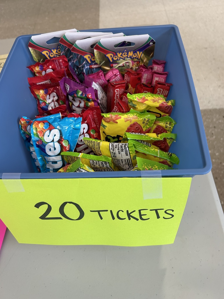 Hastings Middle School students gather around to purchase items with their PRIDE tickets.