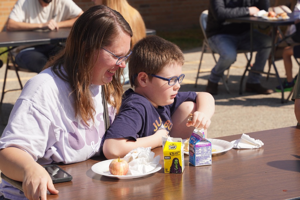 Students and parents chow down at the Southeastern Elementary fall cookout.