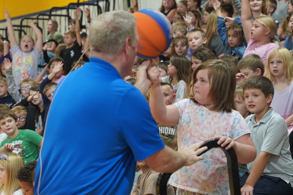 Jim "Basketball" Jones performs for Central Elementary and Hastings Middle School students.
