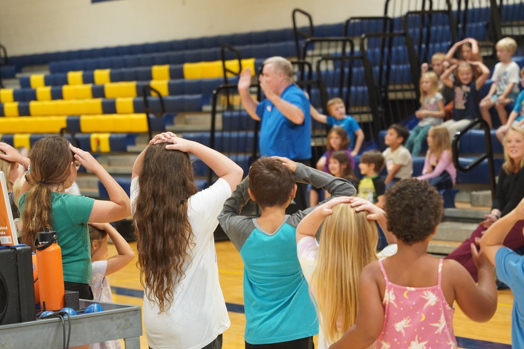 Jim "Basketball" Jones performs for Central Elementary and Hastings Middle School students.