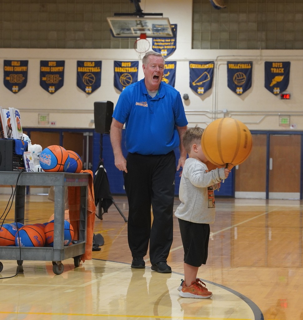 Jim "Basketball" Jones performs for Central Elementary and Hastings Middle School students.