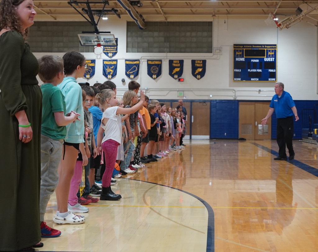 Jim "Basketball" Jones performs for Central Elementary and Hastings Middle School students.