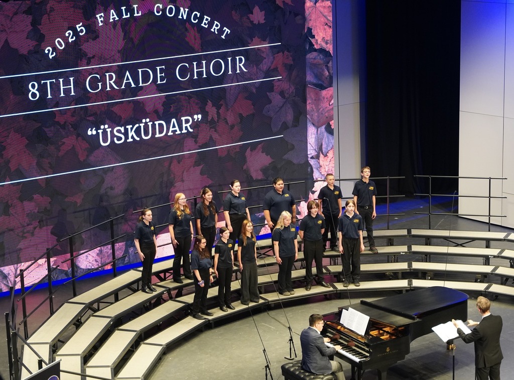 An aerial view of the 8th grade choir from Hastings Middle School performing.