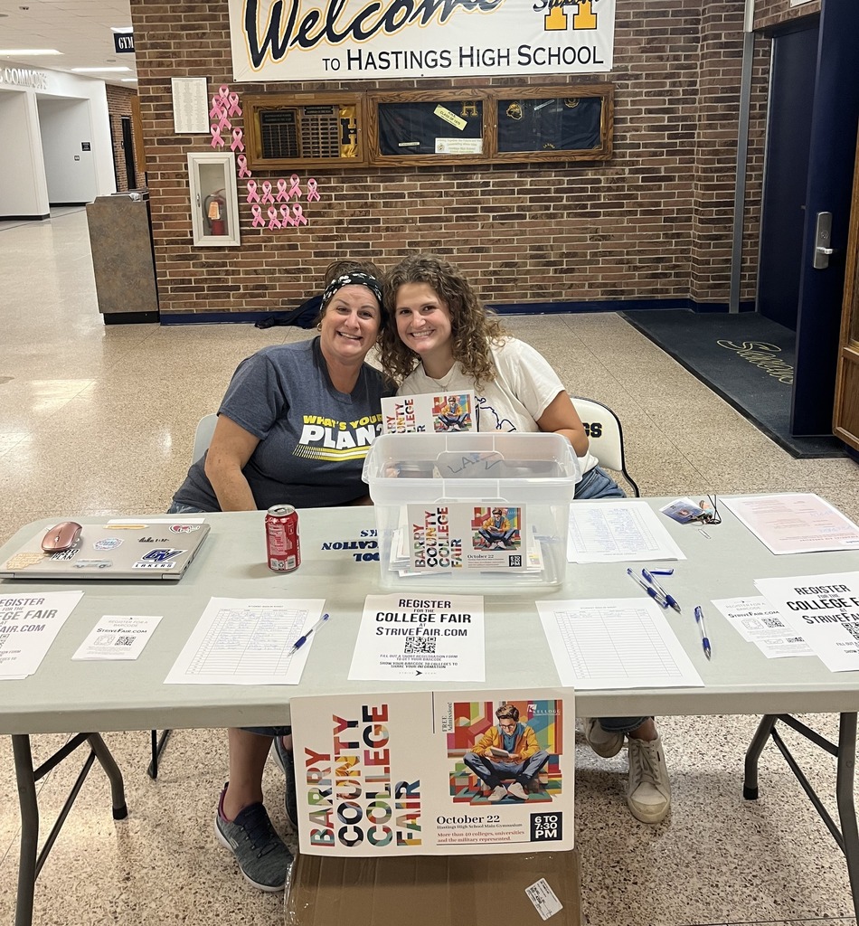 Two Hastings Area School System members pose for a photo at the Barry County College Fair