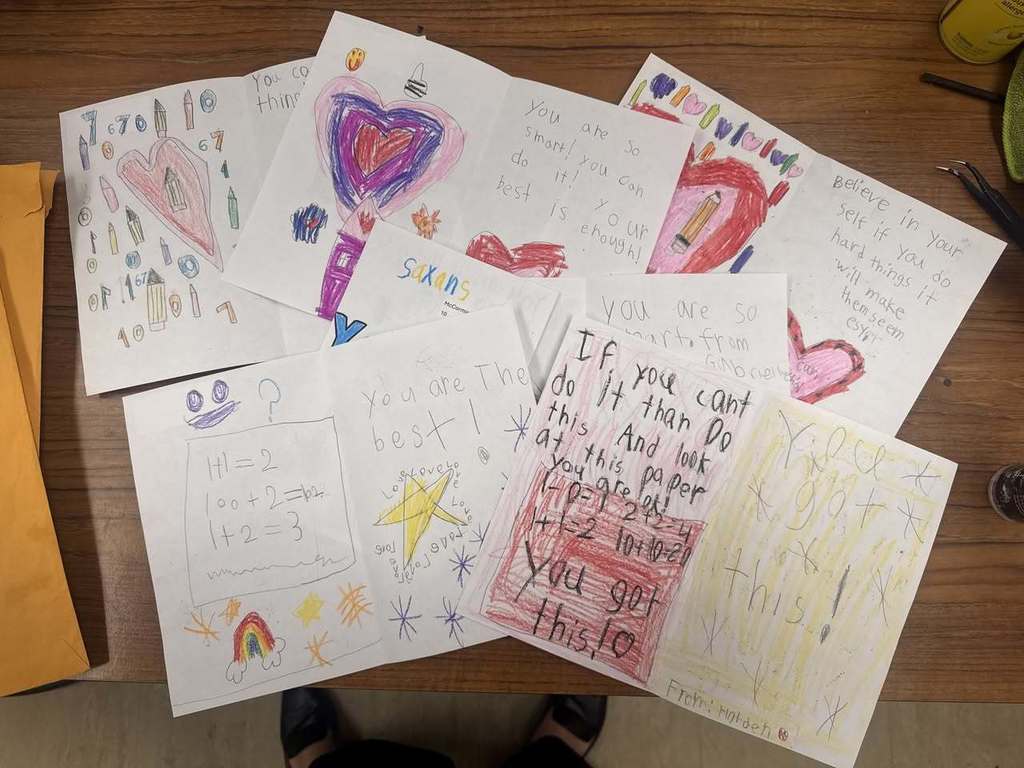 a pile of letters written by children