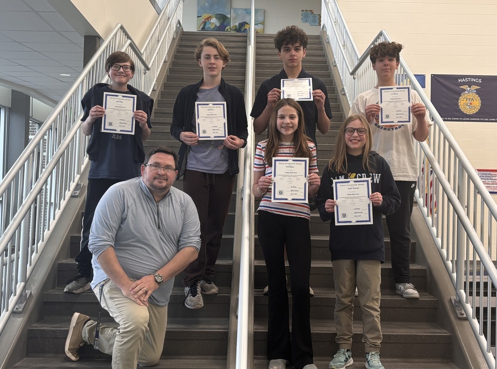 Students posing for their Citizen of the Month photo