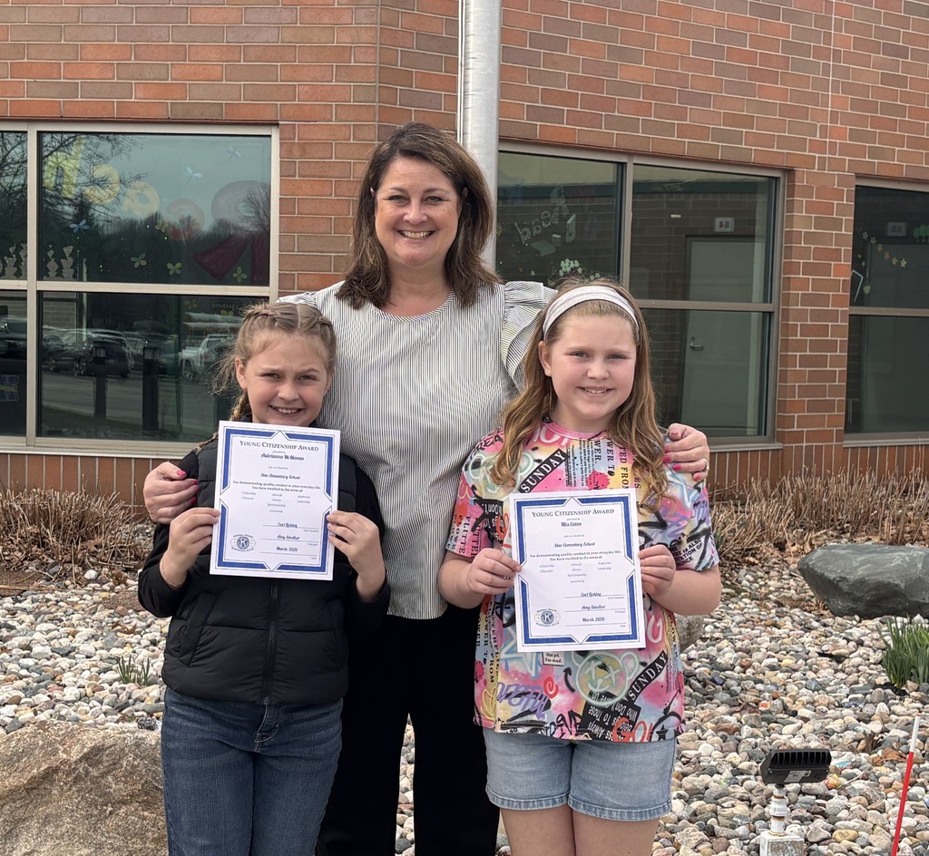 Students posing for their Citizen of the Month photo