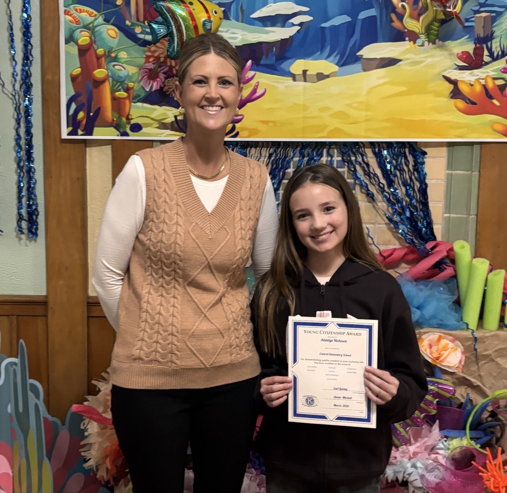 Students posing for their Citizen of the Month photo