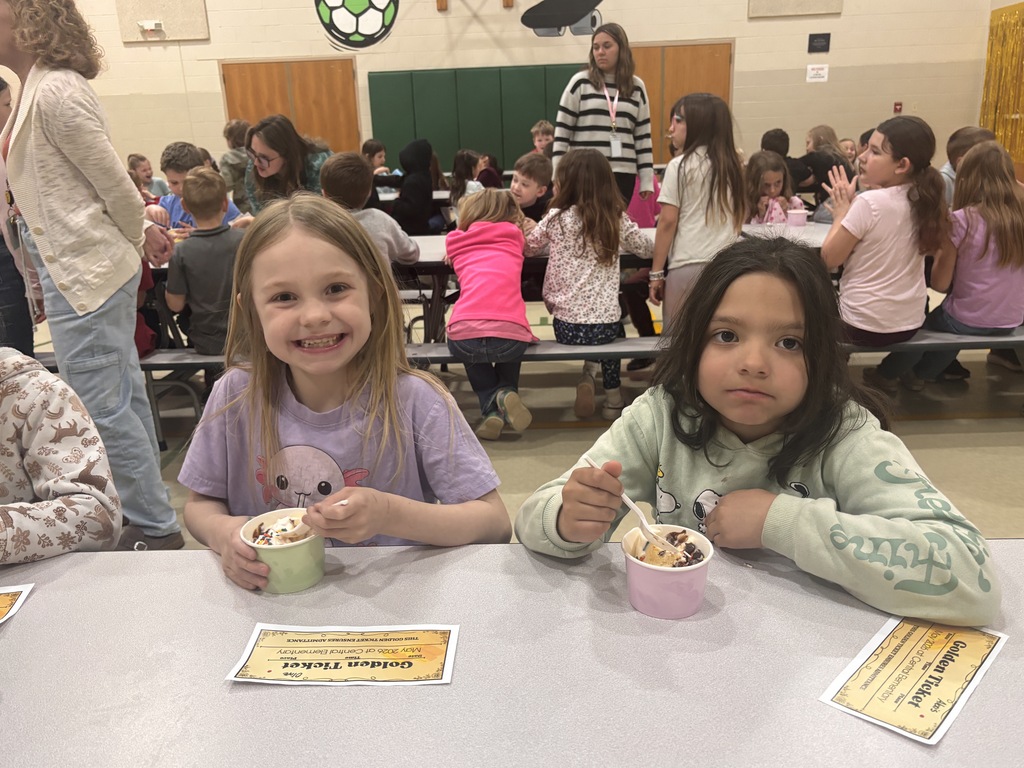Students at Central Elementary enjoy ice cream in the school gym.