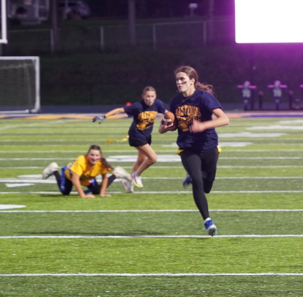 Players participating in a Powderpuff football game