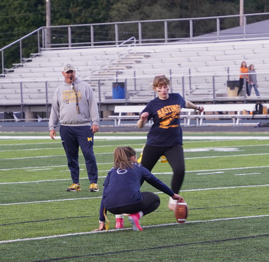 Players participating in a Powderpuff football game