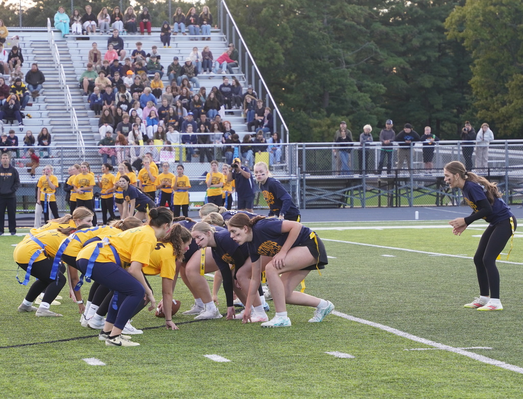 Players participating in a Powderpuff football game