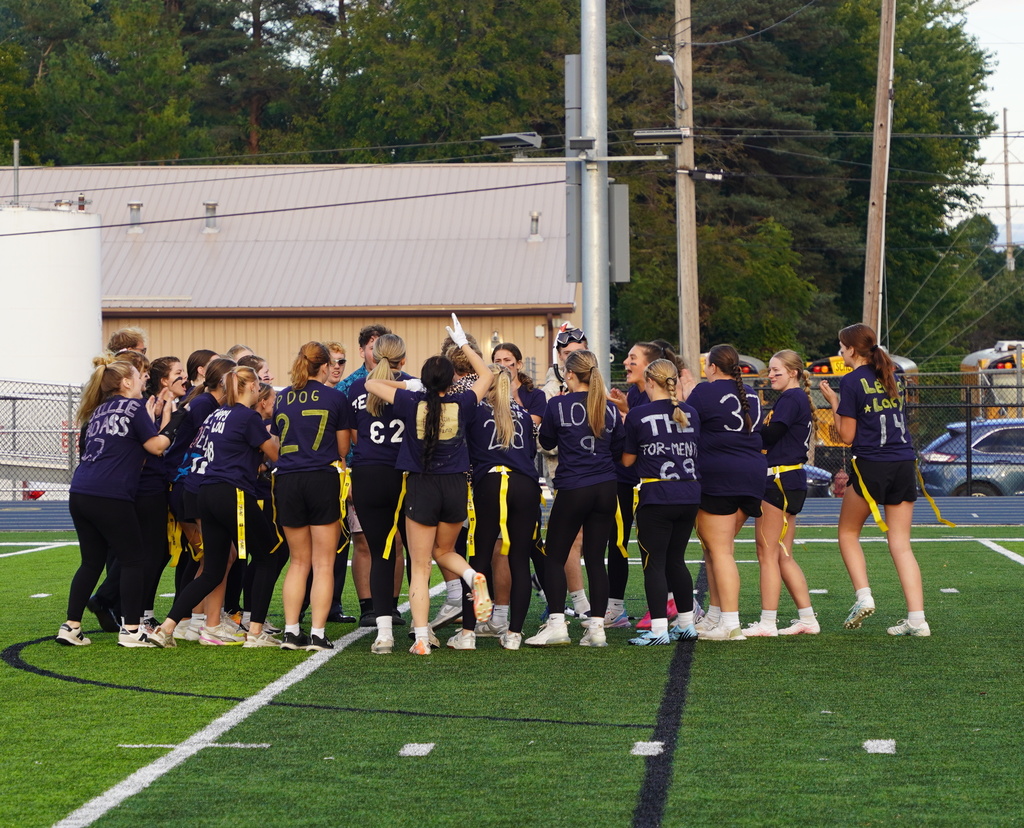 Players participating in a Powderpuff football game