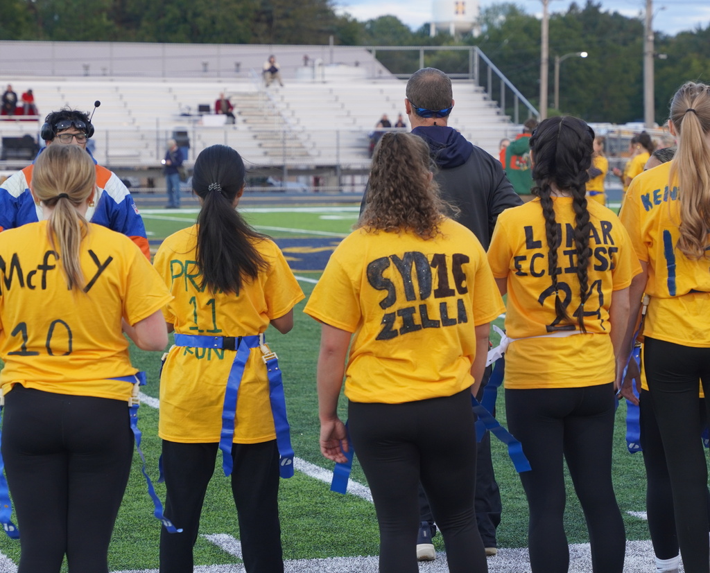 Players participating in a Powderpuff football game