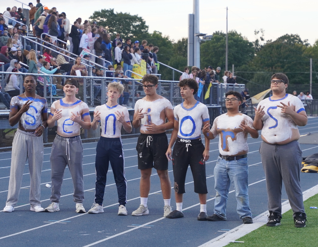 Players participating in a Powderpuff football game
