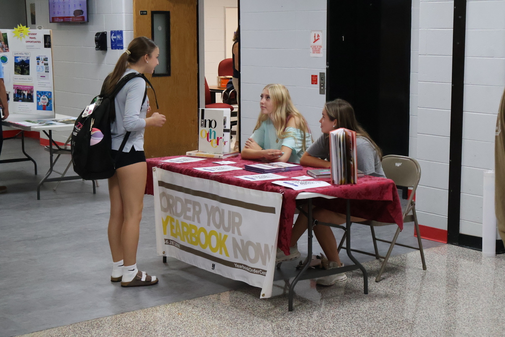 Yearbook, and among many other tables promoting groups and services from the high school, were present at Back to School Night.