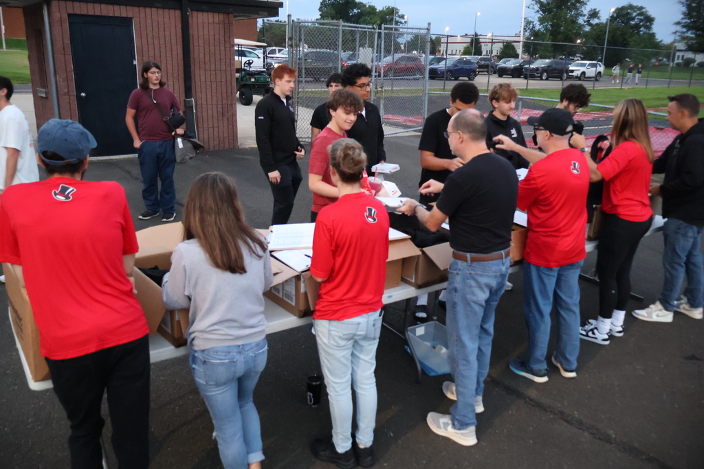 Teachers hand out Senior Shirts