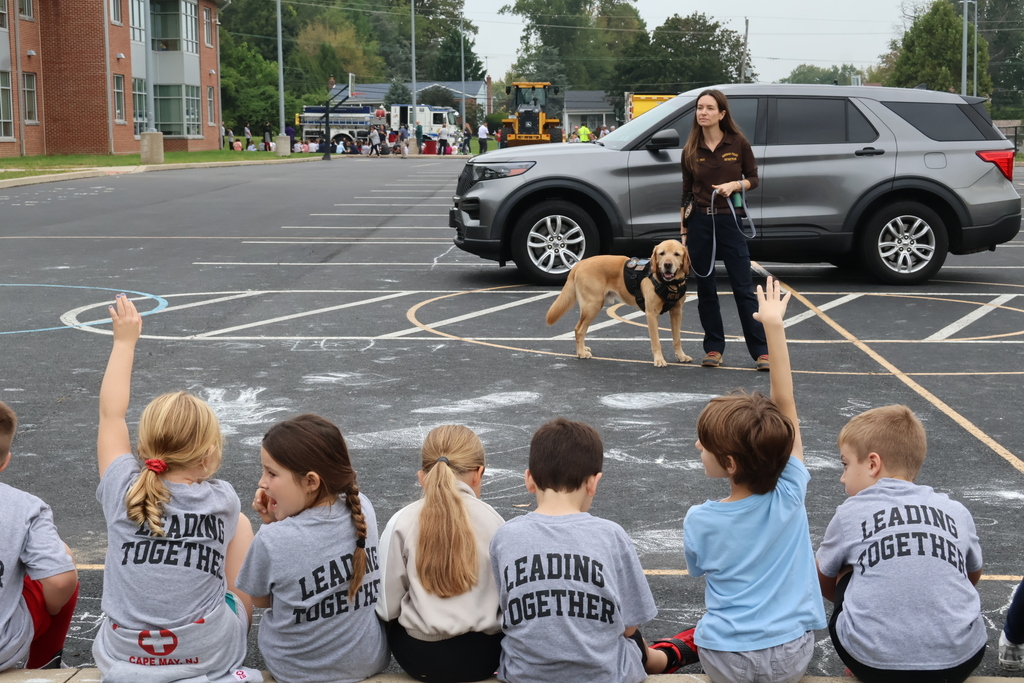 K-9 visits students.
